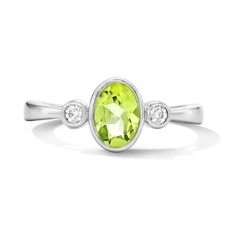 Oval Peridot and 1/15 CT. T.W. Lab-Grown Diamond Ring in Sterling Silver
