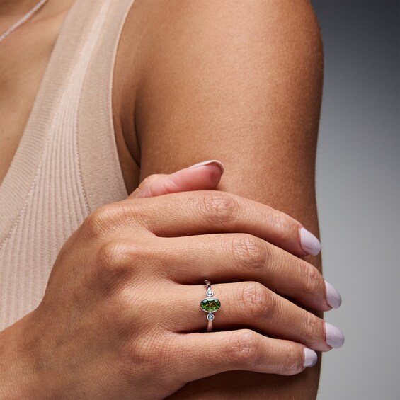 Oval Peridot and 1/15 CT. T.w. Lab-Grown Diamond Ring in Sterling Silver