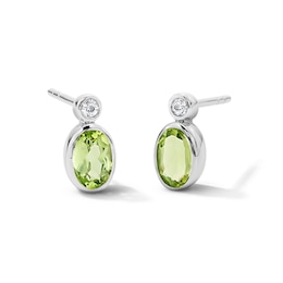 Oval Peridot and Lab-Grown Diamond Stud Earrings in Sterling Silver