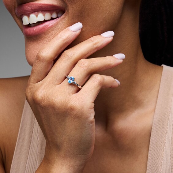 Oval Blue Lab-Created Spinel and 1/15 CT. T.w. Lab-Grown Diamond Ring in Sterling Silver