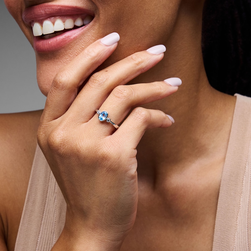 Main Image 2 of Oval Blue Lab-Created Spinel and 1/15 CT. T.W. Lab-Grown Diamond Ring in Sterling Silver