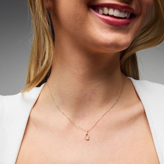 1/20 CT. T.w. Lab-Grown Diamond Letter “Q” Initial Pendant in 10K Gold (F/Vs2)