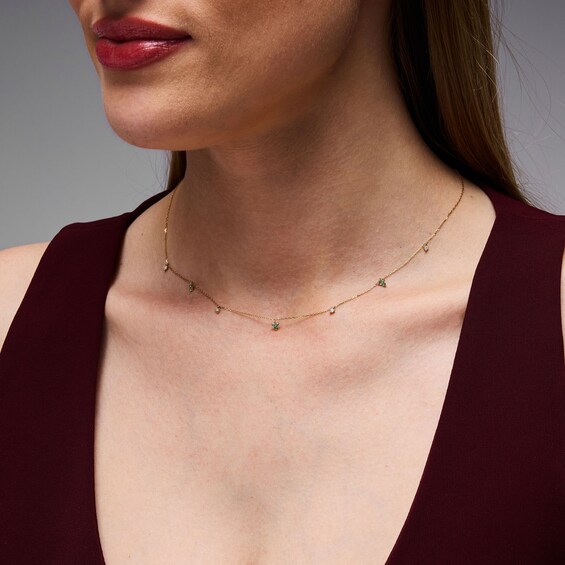 Emerald and 1/15 CT. T.w. Diamond Station Necklace in 10K Gold - 18"