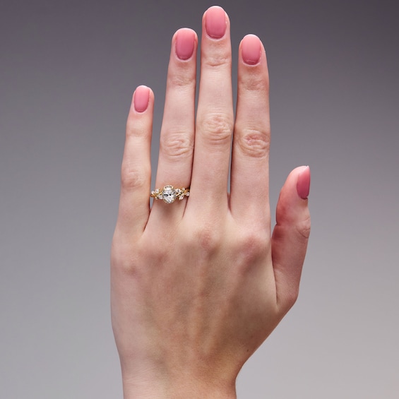 Romantic Vine 7/8 CT. T.w. Oval-Shaped Diamond Frame Engagement Ring in 14K Gold (I/I2)