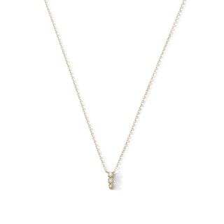 1/10 CT. T.W. Diamond Graduated Three-Stone Necklace in 10K Gold - 18"