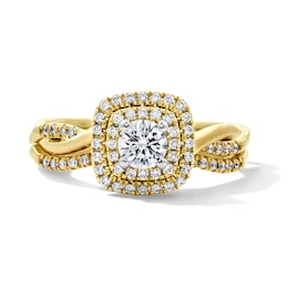 5/8 CT. T.W. Round Lab-Grown Diamond Cushion Frame Twist Shank Bridal Set in 14K Yellow Gold (F/VS2)
