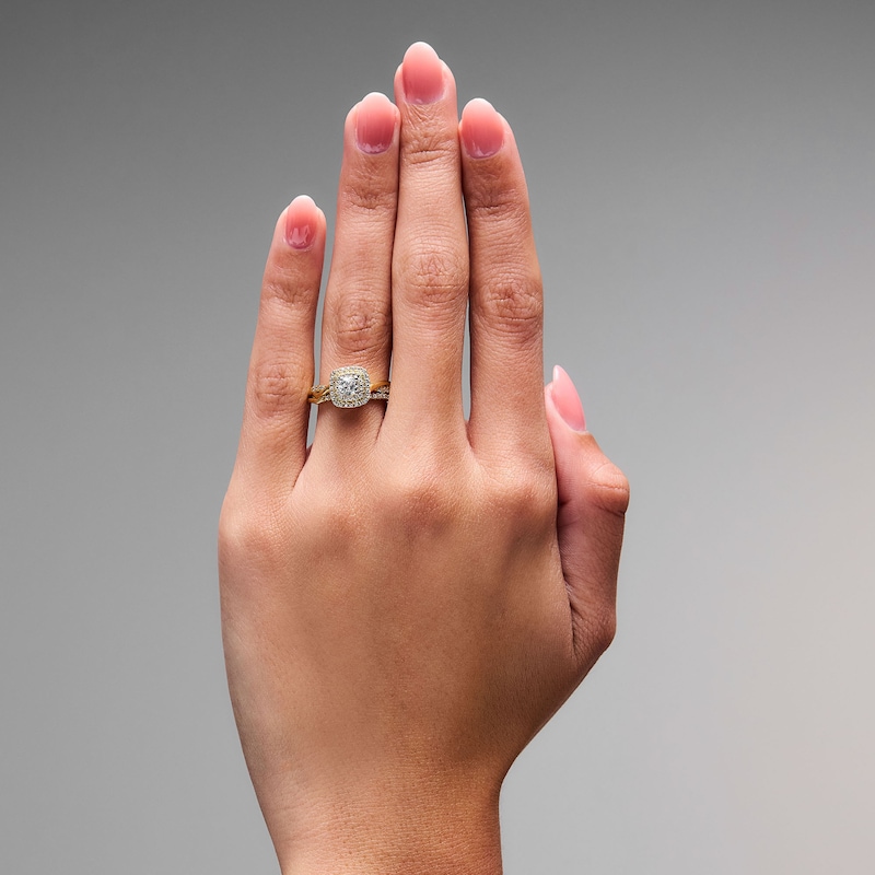Main Image 2 of 5/8 CT. T.W. Round Lab-Grown Diamond Cushion Frame Twist Shank Bridal Set in 14K Yellow Gold (F/VS2)