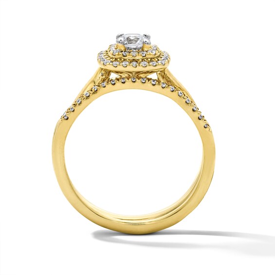 5/8 CT. T.w. Round Lab-Grown Diamond Cushion Frame Twist Shank Bridal Set in 14K Yellow Gold (F/Vs2)