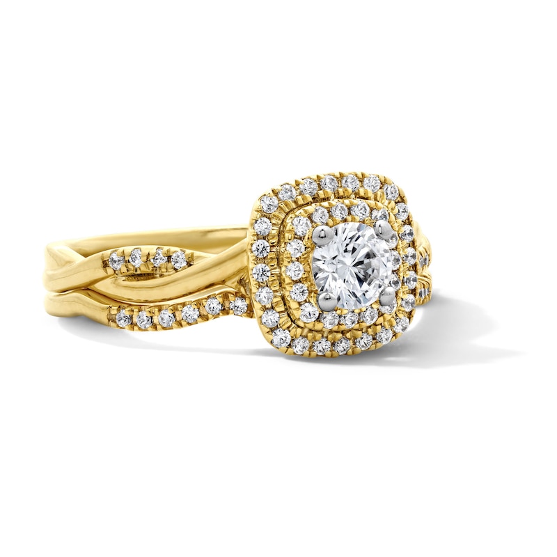 Main Image 4 of 5/8 CT. T.W. Round Lab-Grown Diamond Cushion Frame Twist Shank Bridal Set in 14K Yellow Gold (F/VS2)