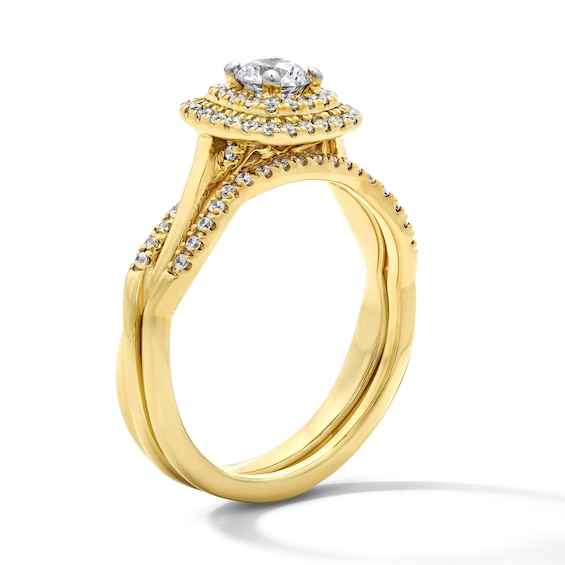 5/8 CT. T.w. Round Lab-Grown Diamond Cushion Frame Twist Shank Bridal Set in 14K Yellow Gold (F/Vs2)