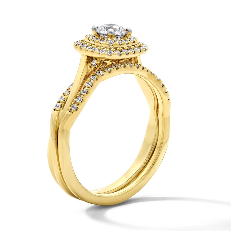 Main Image 5 of 5/8 CT. T.W. Round Lab-Grown Diamond Cushion Frame Twist Shank Bridal Set in 14K Yellow Gold (F/VS2)