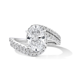 2-5/8 CT. T.W. Oval Certified Lab-Grown Diamond Bypass Bridal Set in 14K White Gold (F/VS2)