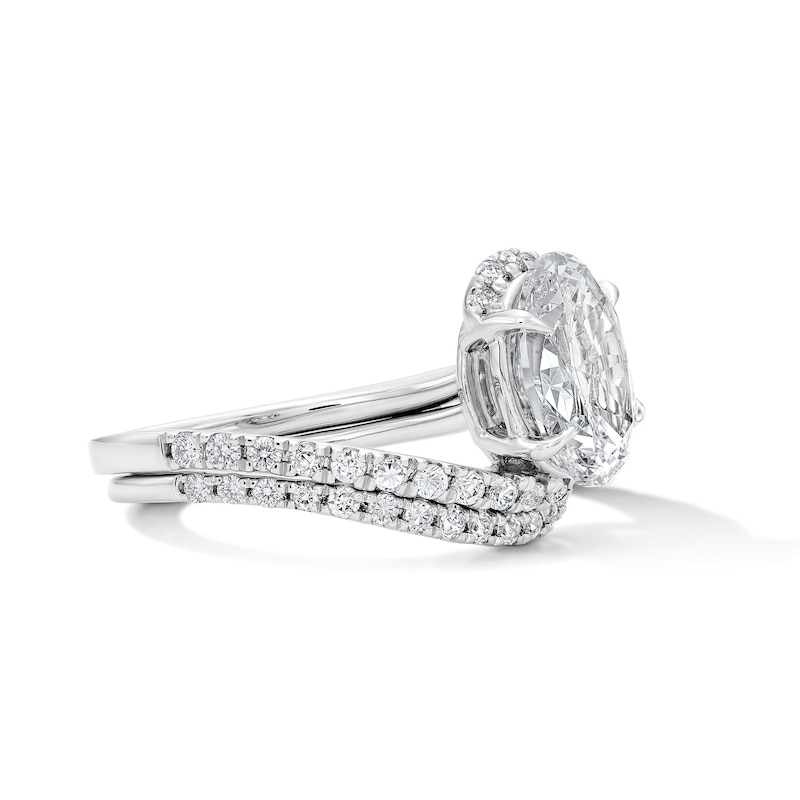 Main Image 4 of 2-5/8 CT. T.W. Oval Certified Lab-Grown Diamond Bypass Bridal Set in 14K White Gold (F/VS2)