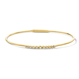 1/5 CT. T.W. Bezel-Set Diamond Bangle Bracelet in 10K Yellow Gold - 7.0"