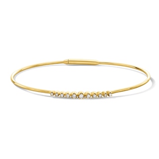 1/5 CT. T.W. Bezel-Set Diamond Bangle Bracelet in 10K Yellow Gold - 7.0"