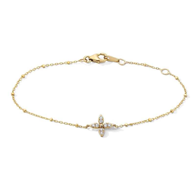 Main Image 1 of 1/10 CT. T.W. Diamond Flower Bracelet in 10K Gold - 7"