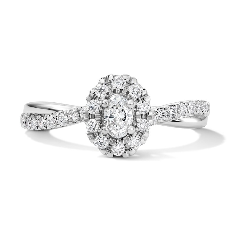 Main Image 1 of 1/2 CT. T.W. Oval Certified Lab-Grown Diamond Frame Promise Ring in 10K White Gold (F/VS2)