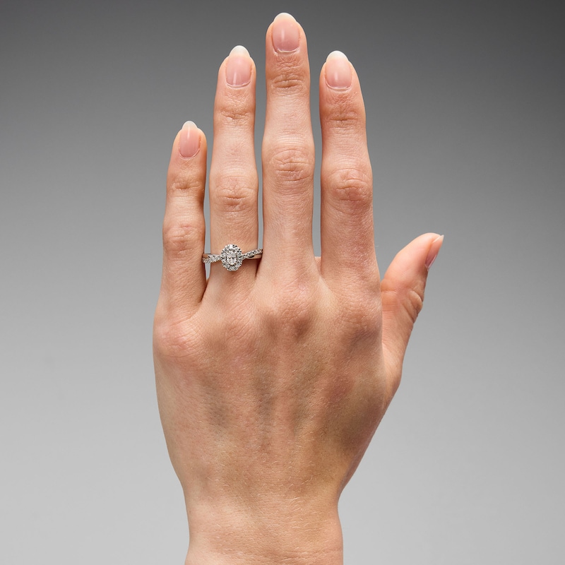 Main Image 2 of 1/2 CT. T.W. Oval Certified Lab-Grown Diamond Frame Promise Ring in 10K White Gold (F/VS2)