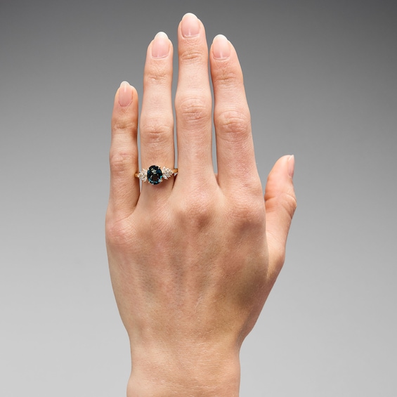 Oval London Blue Topaz and 1/3 CT. T.w. Certified Lab-Grown Diamond Engagement Ring in 14K Gold (F/Vs2)