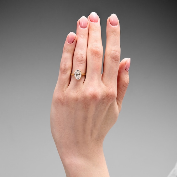 3 CT. T.w. Oval Certified Lab-Grown Diamond Solitaire Engagement Ring in 14K Gold (F/Vs2)