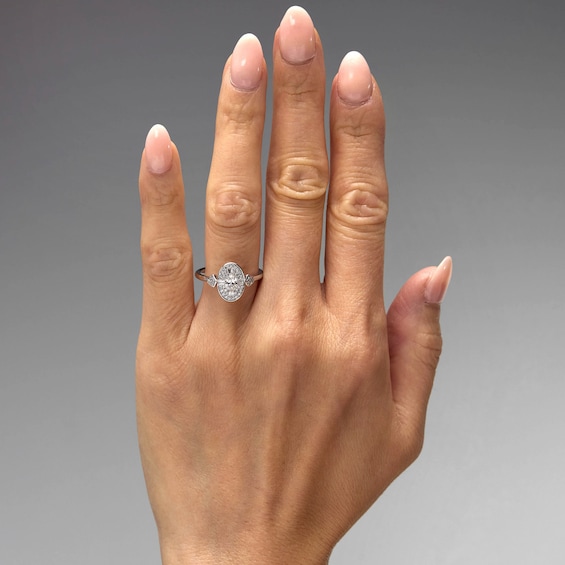 1/2 CT. T.w. Oval Certified Lab-Grown Diamond Double Frame Engagement Ring in 14K White Gold (F/Vs2)