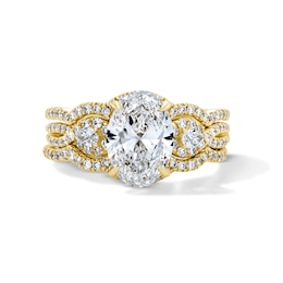 3 CT. T.W. Oval Certified Lab-Grown Diamond Three-Piece Bridal Set in 14K Gold (F/VS2)
