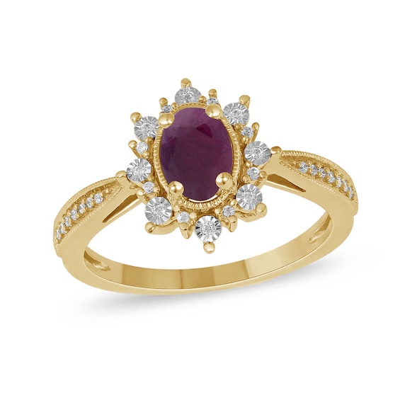 Oval Ruby and 1/10 CT. T.w. Diamond Starburst Frame Ring in 10K Gold