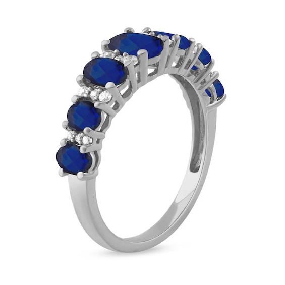 Oval Blue Sapphire and 1/6 CT. T.w. Diamond Graduated Ring in 10K White Gold