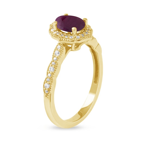 Oval Ruby and 1/6 CT. T.w. Diamond Milgrain Frame Ring in 10K Gold