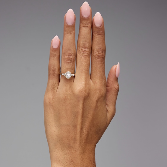 7/8 CT. T.w. Oval Certified Lab-Grown Diamond Frame Engagement Ring in 14K Gold (F/Vs2)