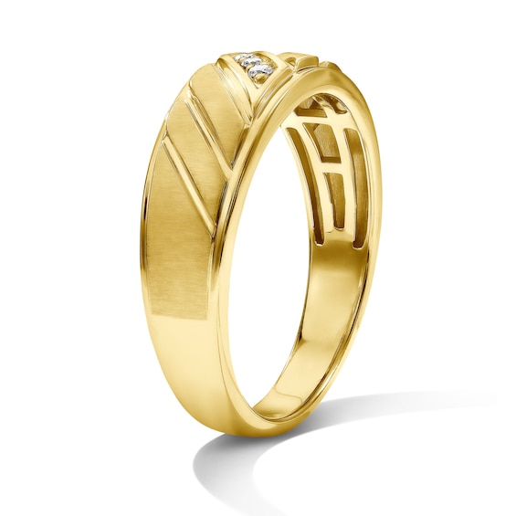 1/20 CT. T.w. Diamond Three-Stone Slant Groove Wedding Band in 10K Gold