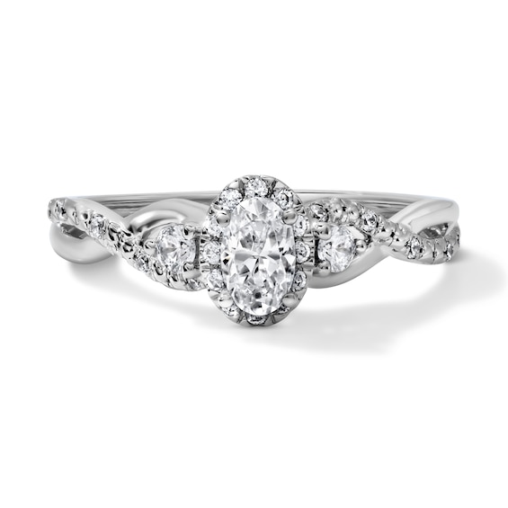 1/2 CT. T.w. Certified Oval Lab-Grown Diamond Frame Engagement Ring in 14K White Gold (F/Vs2)