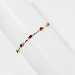 Oval Lab-Created Ruby and Diamond Accent Bracelet in Sterling Silver with 18K Gold Plate - 7.25"
