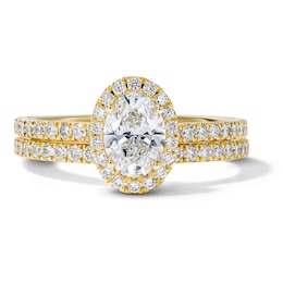 1-1/4 CT. T.W. Certified Oval Lab-Grown Diamond Frame Bridal Set in 14K Yellow Gold (F/VS2)