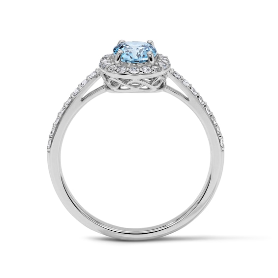 Oval Swiss Blue Topaz and White Lab-Created Sapphire Frame Ring in Sterling Silver