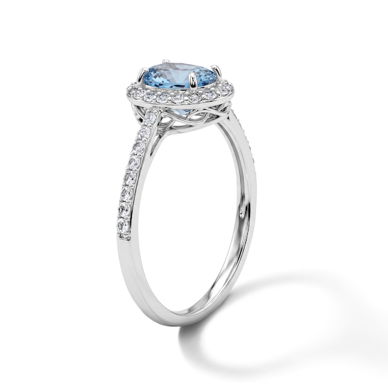 Oval Swiss Blue Topaz and White Lab-Created Sapphire Frame Ring in Sterling Silver