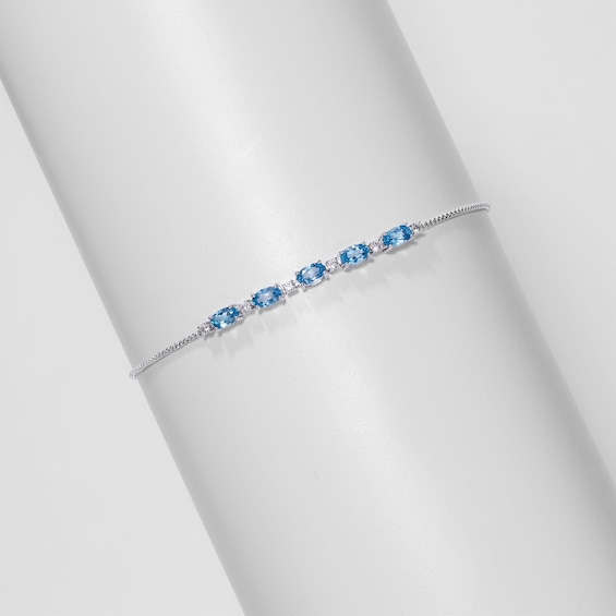 Oval Swiss Blue Topaz and White Lab-Created Sapphire Adjustable Bracelet in Sterling Silver - 9"
