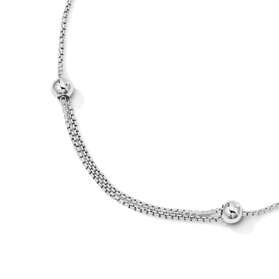 Oval Swiss Blue Topaz and White Lab-Created Sapphire Adjustable Bracelet in Sterling Silver - 9"