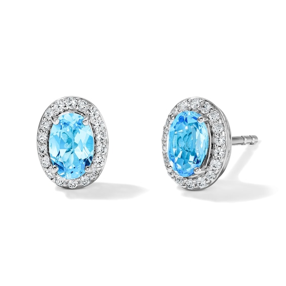 Oval Swiss Blue Topaz and White Lab-Created Sapphire Frame Stud Earrings in Sterling Silver