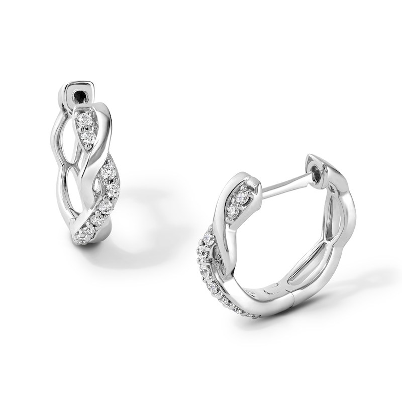 Main Image 1 of 1/5 CT. T.W. Diamond Twist Hoops in Sterling Silver