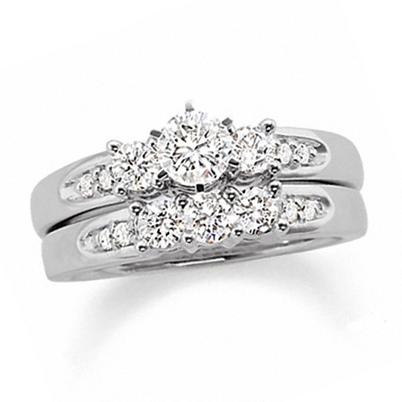 Main Image 1 of Previously Owned - 1-1/2 CT. T.W. Diamond Channel Three Stone Bridal Set in 14K White Gold