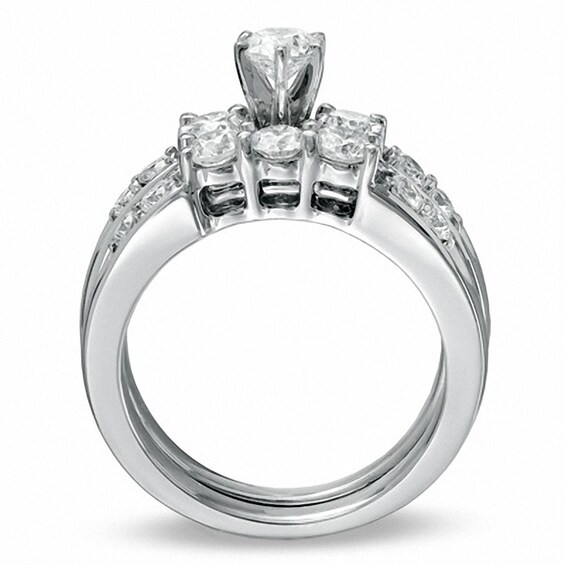 Previously Owned - 1-1/2 CT. T.w. Diamond Channel Three Stone Bridal Set in 14K White Gold