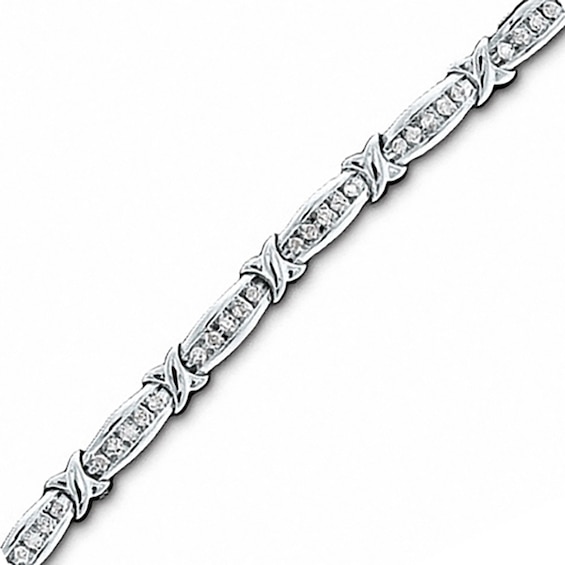 Previously Owned - 1 CT. T.w. Diamond Channel "X" Link Bracelet in 10K White Gold
