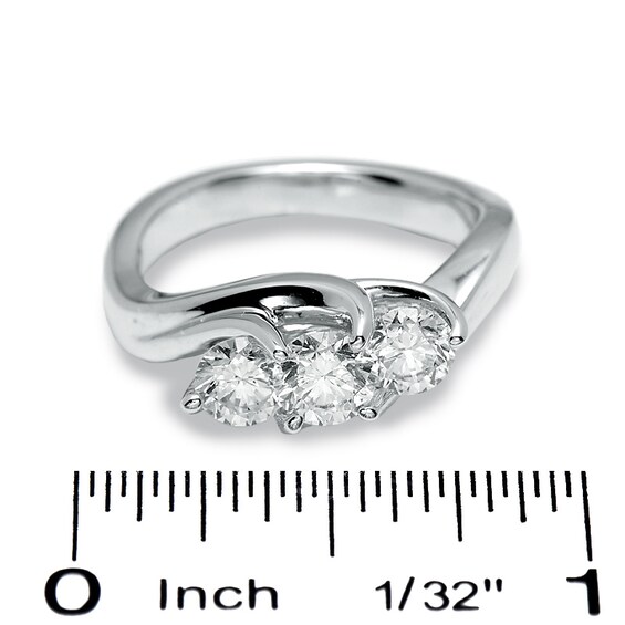 Previously Owned - 1-1/2 CT. T.w. Diamond Diagonal Three Stone Ring in 14K White Gold