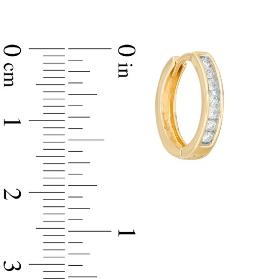Previously Owned - 1/4 CT. T.w. Diamond Huggie Hoop Earrings in 10K Gold