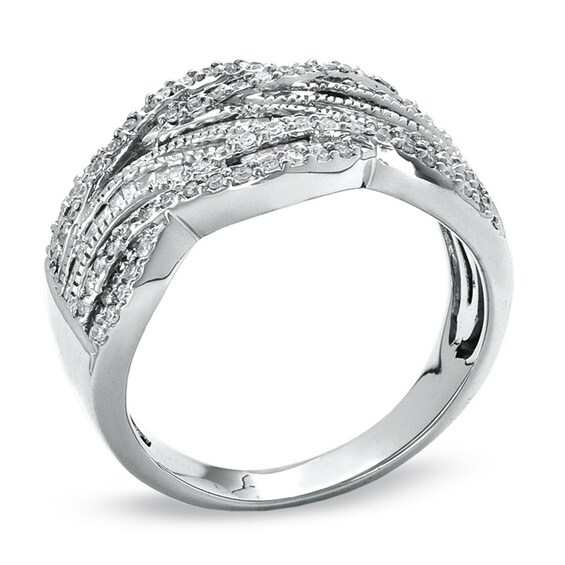 Previously Owned - 1/2 CT. T.w. Round and Baguette Diamond Swirl Band in 10K White Gold