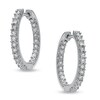Thumbnail Image 1 of Previously Owned - 1/8 CT. T.W. Diamond Sparkle Hoop Earrings in Sterling Silver