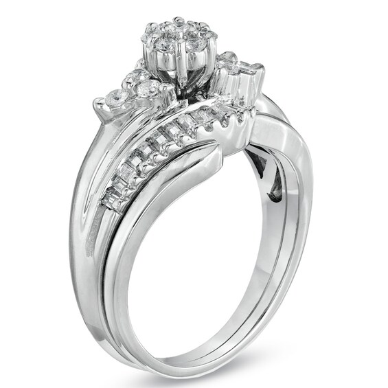 Previously Owned - 1/2 CT. T.w. Diamond Cluster Swirl Bridal Set in 10K White Gold