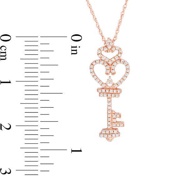 Previously Owned - 1/6 CT. T.w. Diamond Heart-Top Key Pendant in 10K Rose Gold