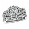 Thumbnail Image 1 of Previously Owned - 1-1/5 CT. T.W. Diamond Cluster Bridal Set in 14K White Gold